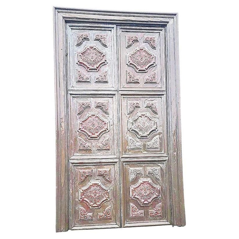 Large 8' Mediterranean Multipaneled Molding Bronze Covered Walnut Double Doors
