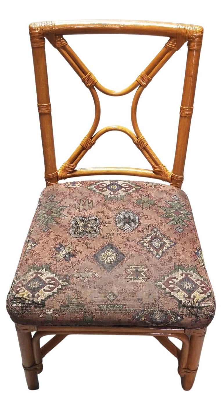 Restored Rattan set of 6 Dining Chairs Featuring X-back and Leather Wrappings.