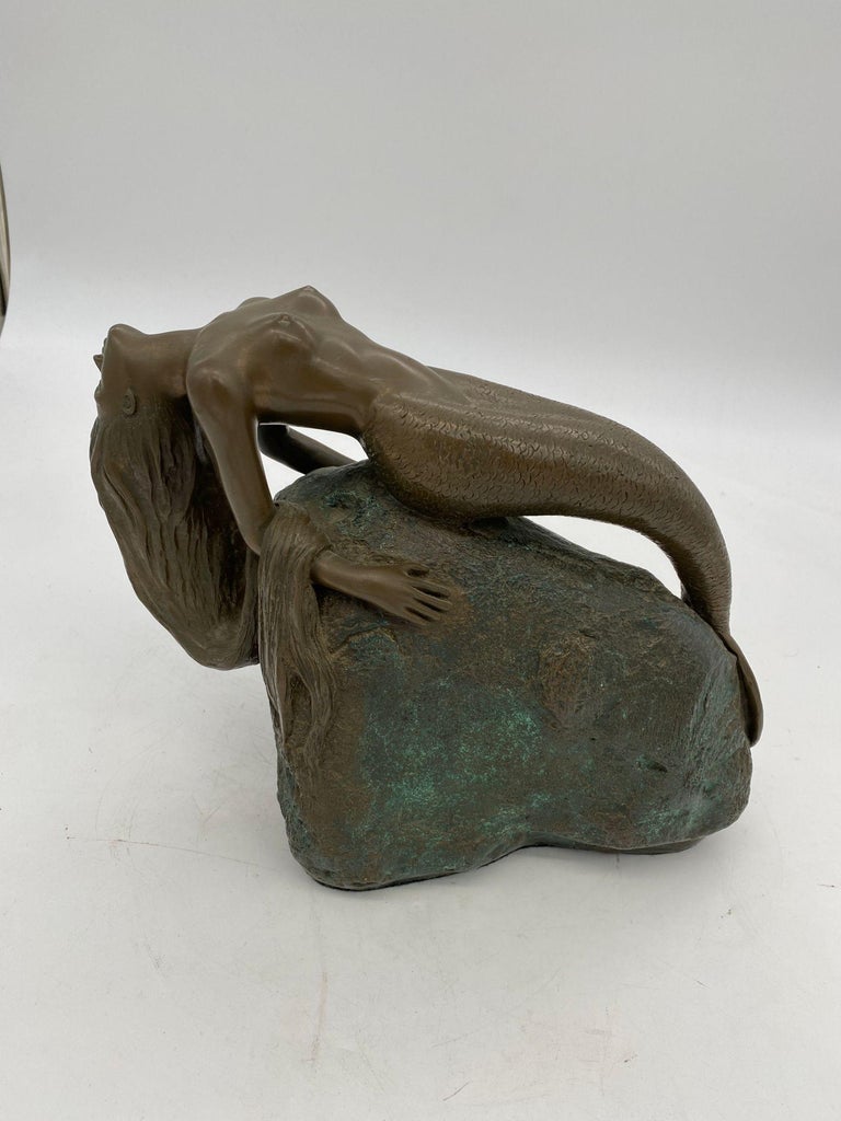Bronze Mermaid Siren Statue on Beach Rock by James Siebert