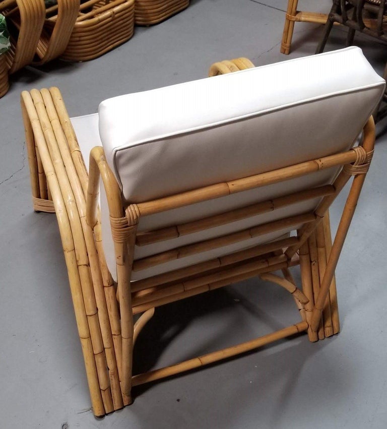 Restored 4-Strand Staple Arm Rattan Lounge Chair by Paul Laszlo