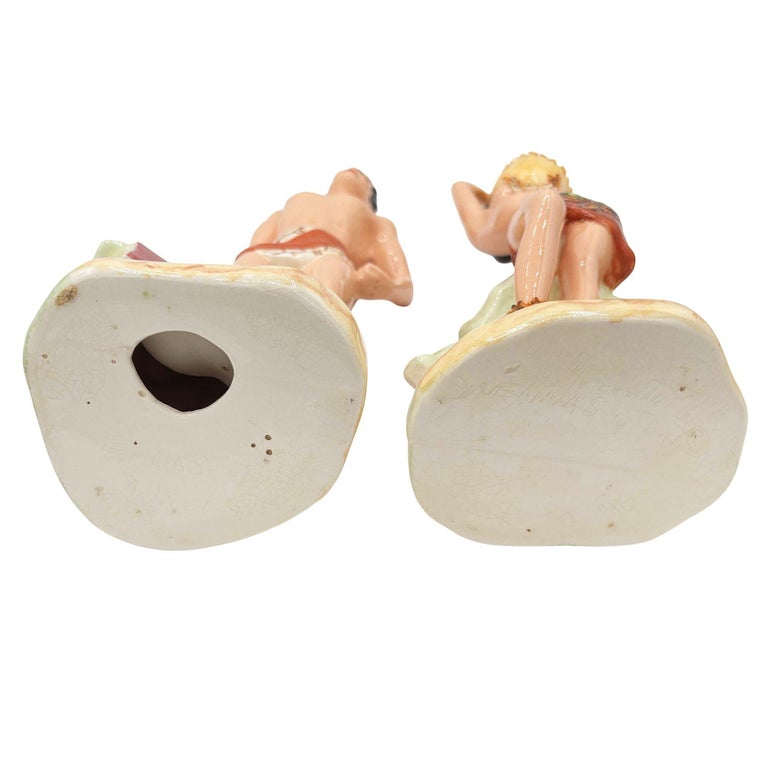 Mid-Century Hand Painted Hawaiian Hula Girl & Native Male Ceramic Statue Set
