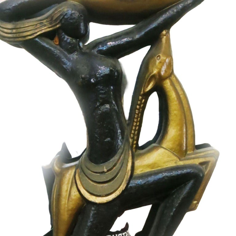 Very Large Midcentury Wall Mirror with Carved Tribal Sculptures in the Center