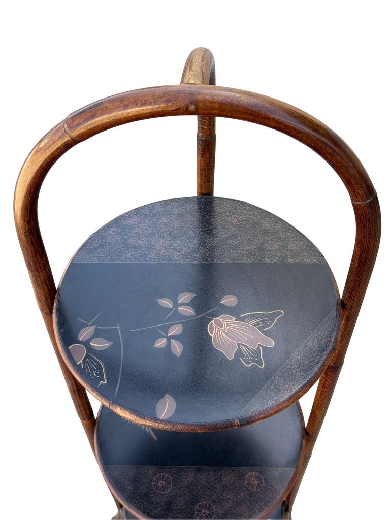 Costal Three Tiered Dark Stained Rattan Shelf w East Asian Motif Tops