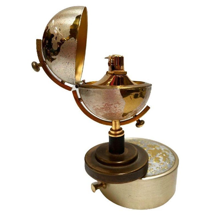 Mid-century Brass Spinning Music Box Globe Desktop Table Lighter by Windmill