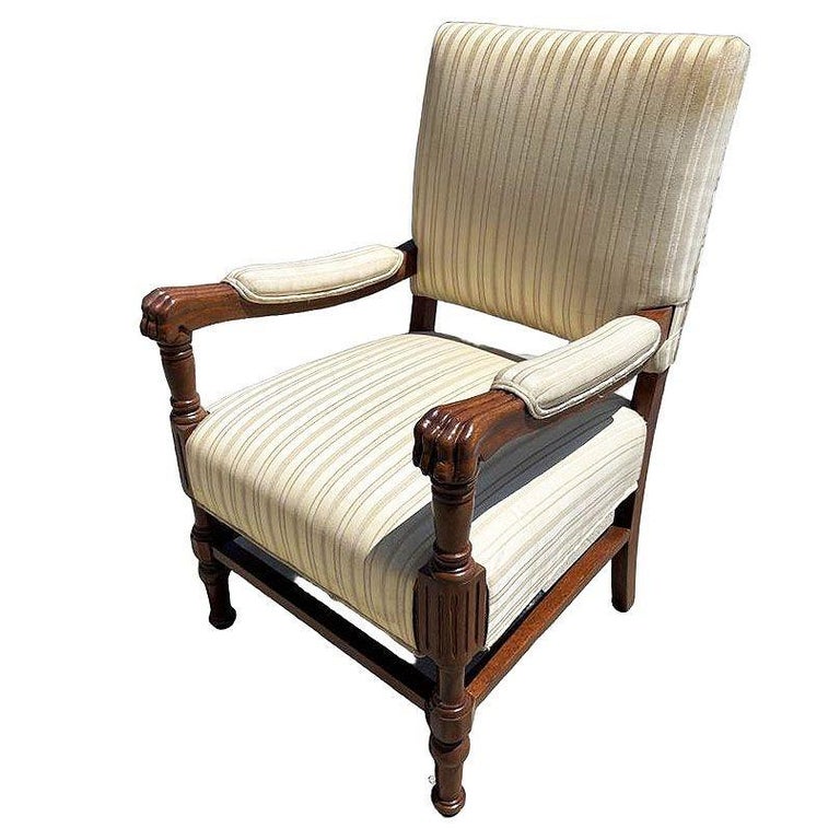 Pair of Mediterranean Style Carved Walnut Lion Paw Armchairs