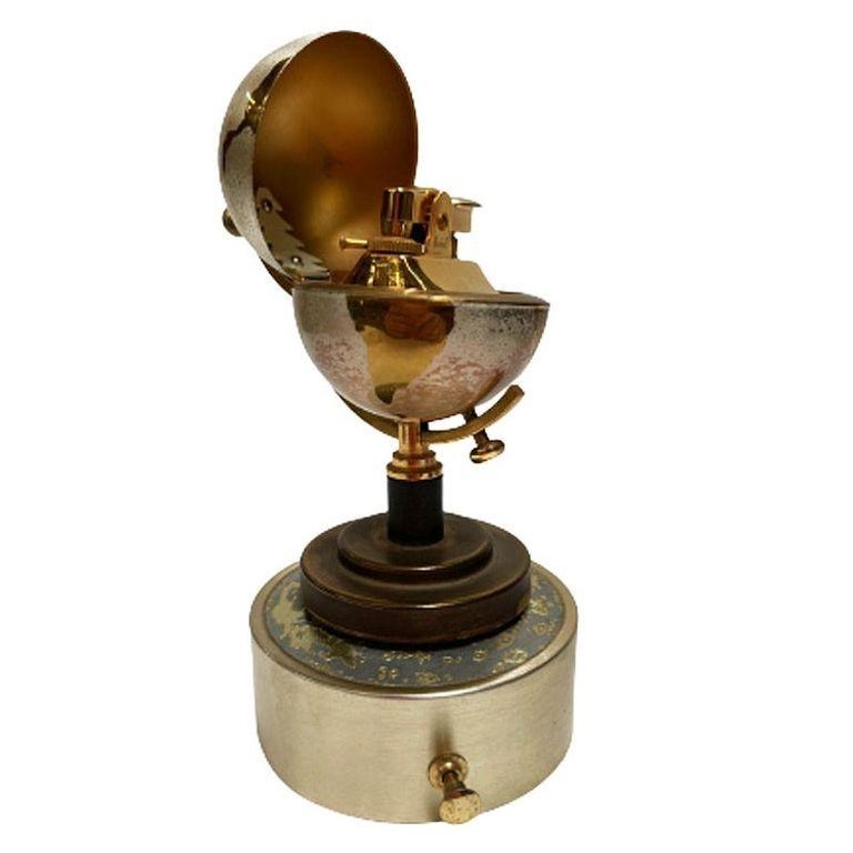 Mid-century Brass Spinning Music Box Globe Desktop Table Lighter by Windmill