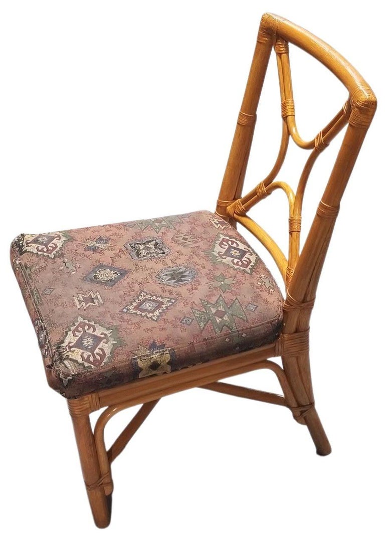 Restored Rattan set of 6 Dining Chairs Featuring X-back and Leather Wrappings.