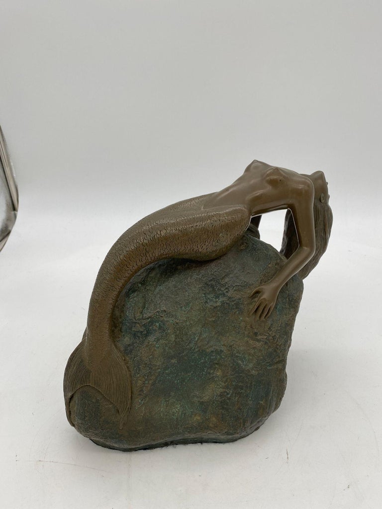Bronze Mermaid Siren Statue on Beach Rock by James Siebert