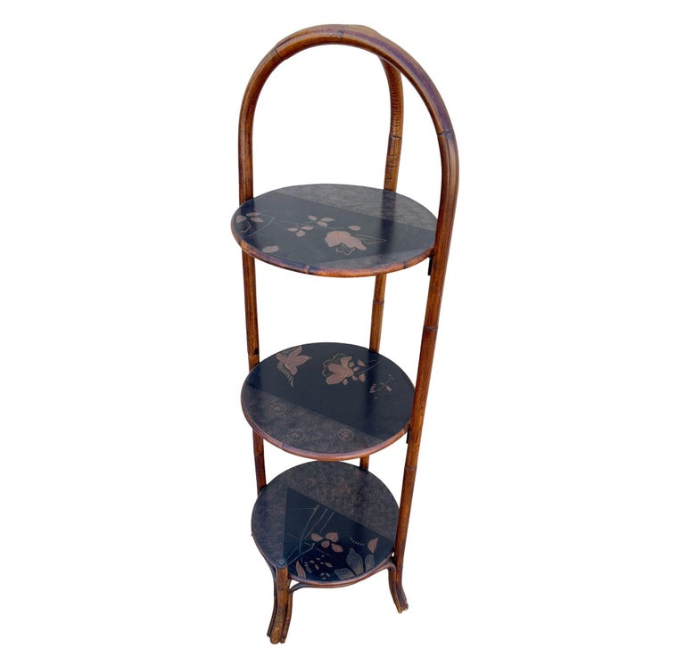 Costal Three Tiered Dark Stained Rattan Shelf w East Asian Motif Tops