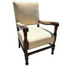 Pair of Mediterranean Style Carved Walnut Lion Paw Armchairs