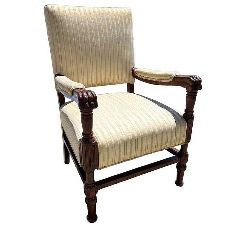 Pair of Mediterranean Style Carved Walnut Lion Paw Armchairs