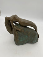 Bronze Mermaid Siren Statue on Beach Rock by James Siebert
