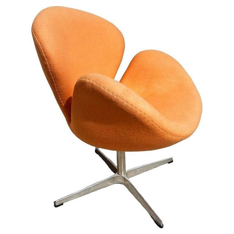 Punmkin Orange Swan Chair in the style of Arne Jacobsen