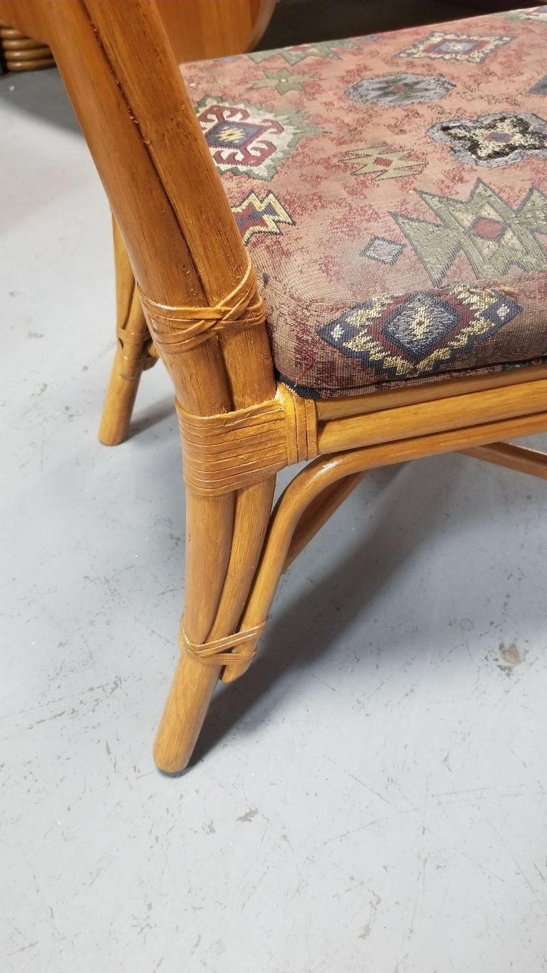 Restored Rattan set of 6 Dining Chairs Featuring X-back and Leather Wrappings.