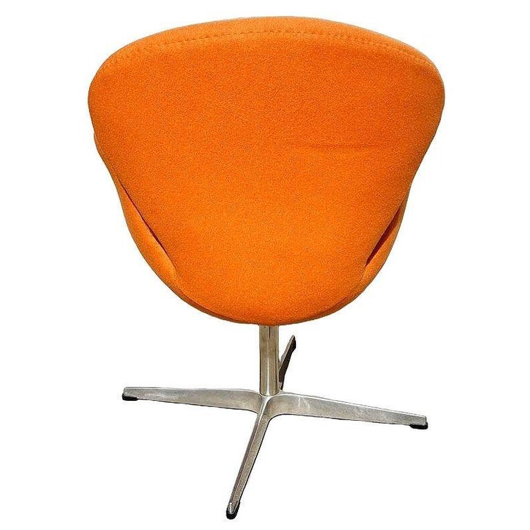 Punmkin Orange Swan Chair in the style of Arne Jacobsen