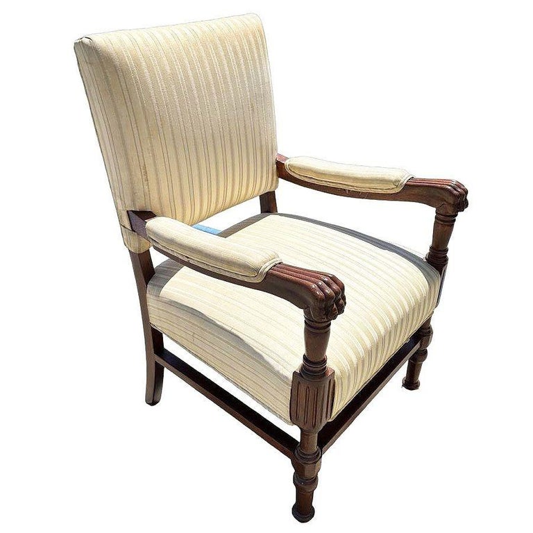 Pair of Mediterranean Style Carved Walnut Lion Paw Armchairs