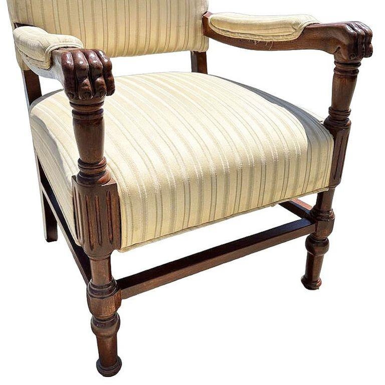 Pair of Mediterranean Style Carved Walnut Lion Paw Armchairs