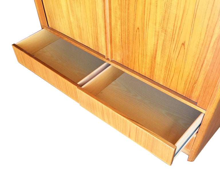 Side Rolling Front Wardrobe w Media Center, Chest of Drawers