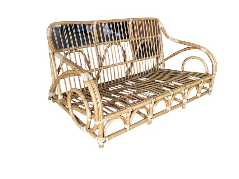 Restored Two-Strand "Circles and Speed" Three Seat Rattan Sofa