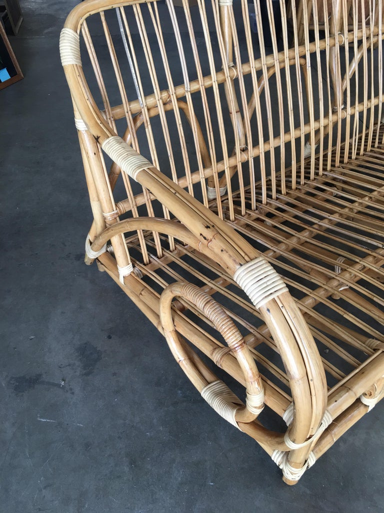 Restored Two-Strand "Circles and Speed" Three Seat Rattan Sofa