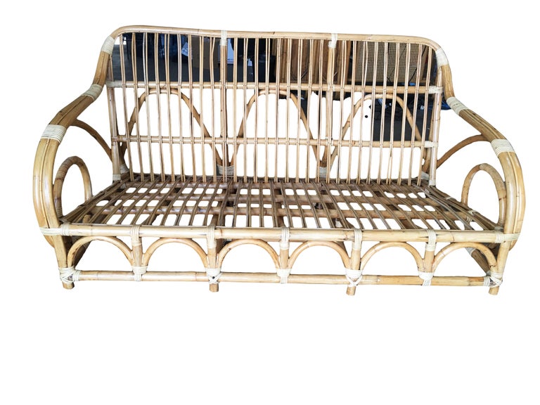 Restored Two-Strand "Circles and Speed" Three Seat Rattan Sofa